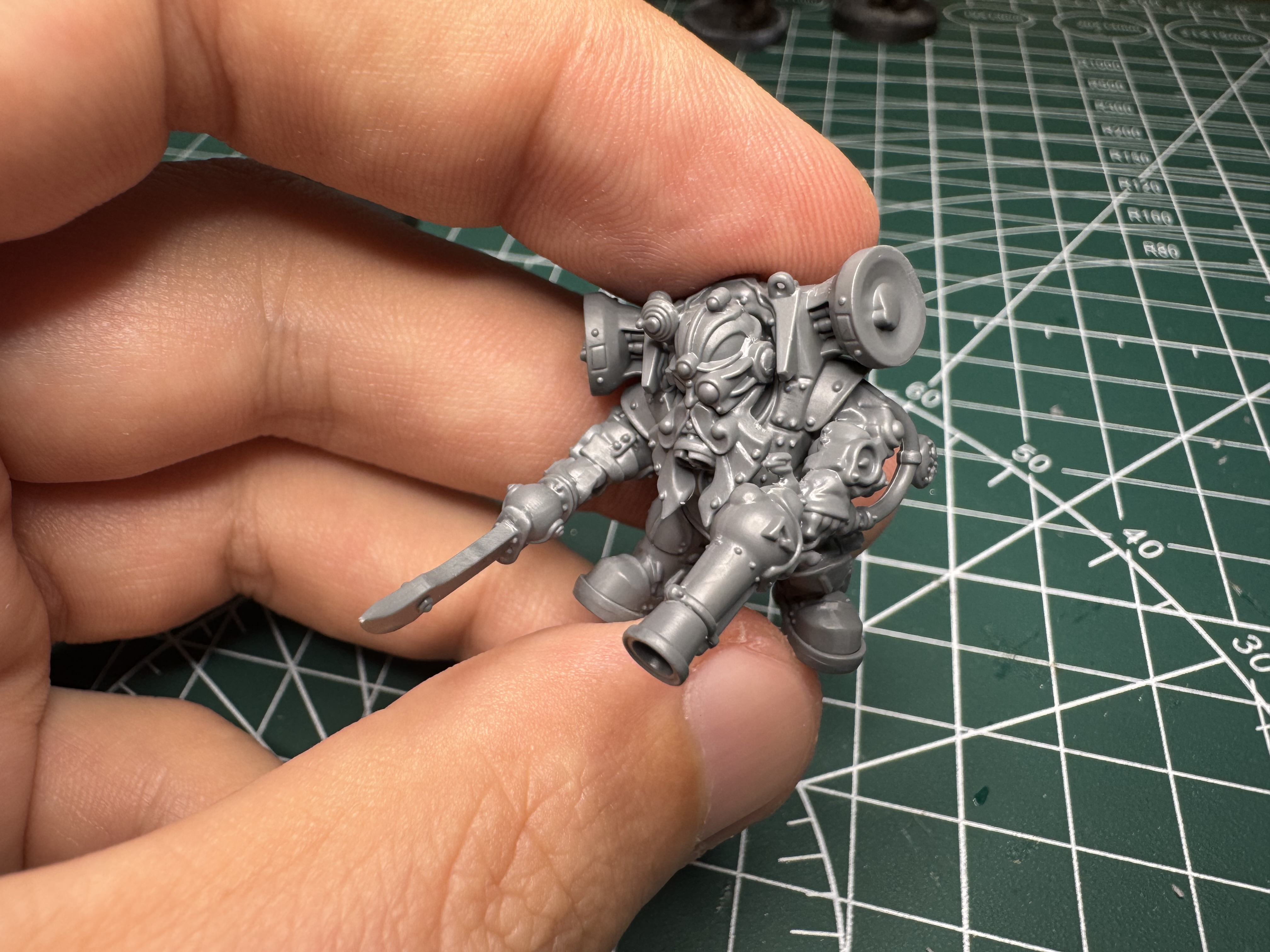 Kharadron boss model on sprue/early assembly