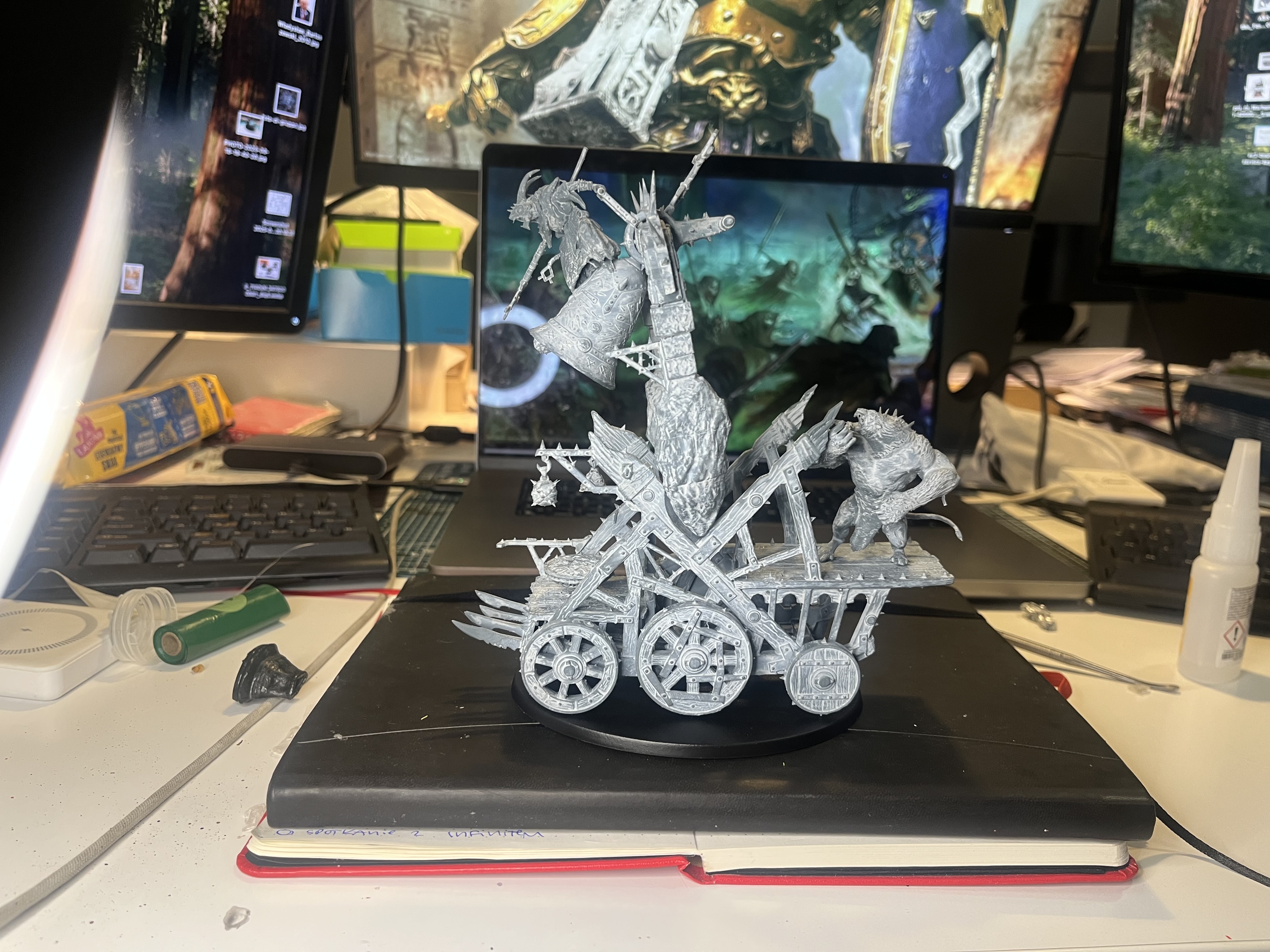 A massive Skaven model with a Rat Ogor for scale