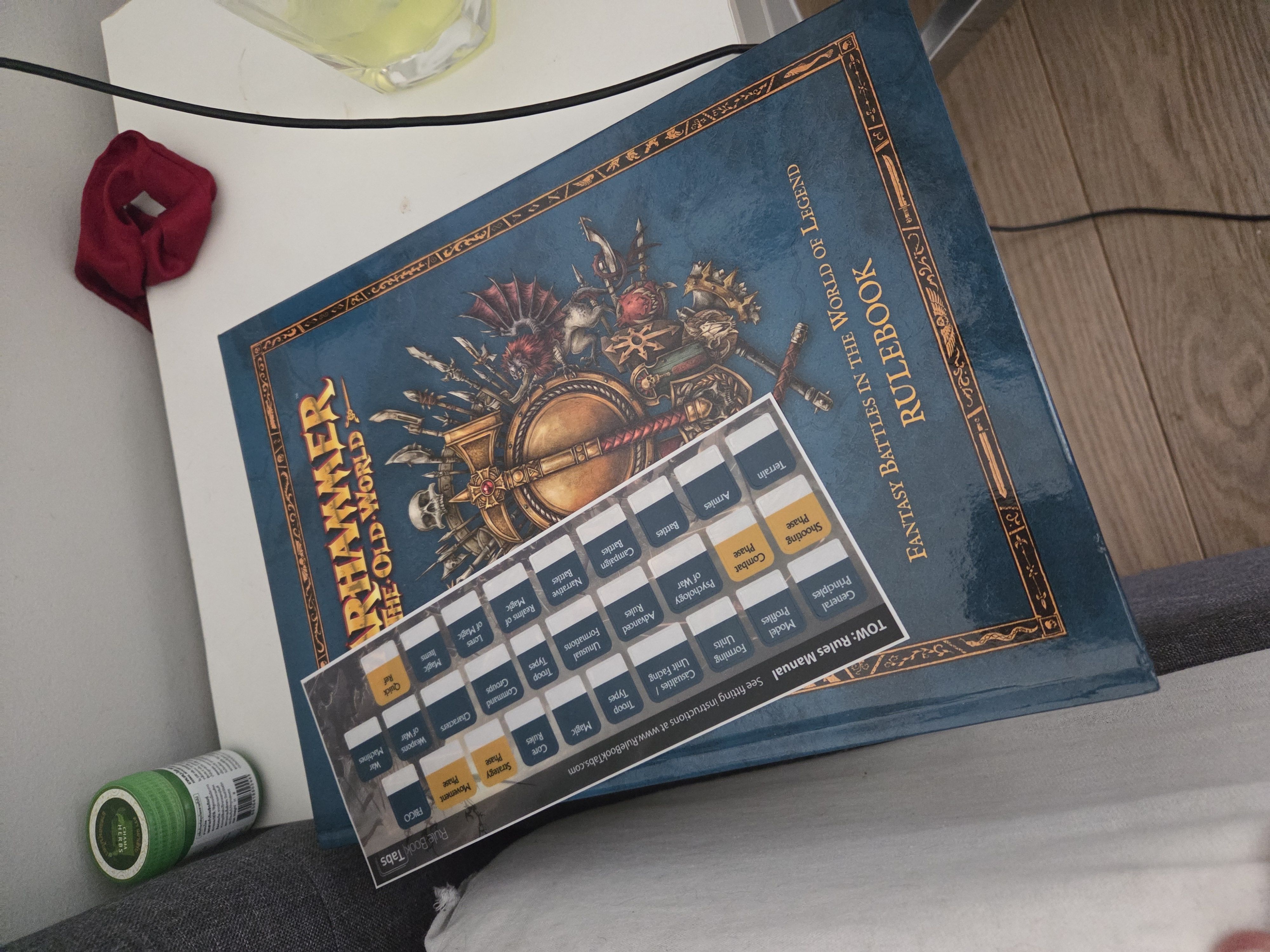 Rulebook with bookmarks ready for study